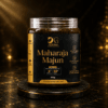 DG Herbal Maharaja Majun Ayurvedic wellness supplement container with premium black and gold packaging on a luxury dark background.